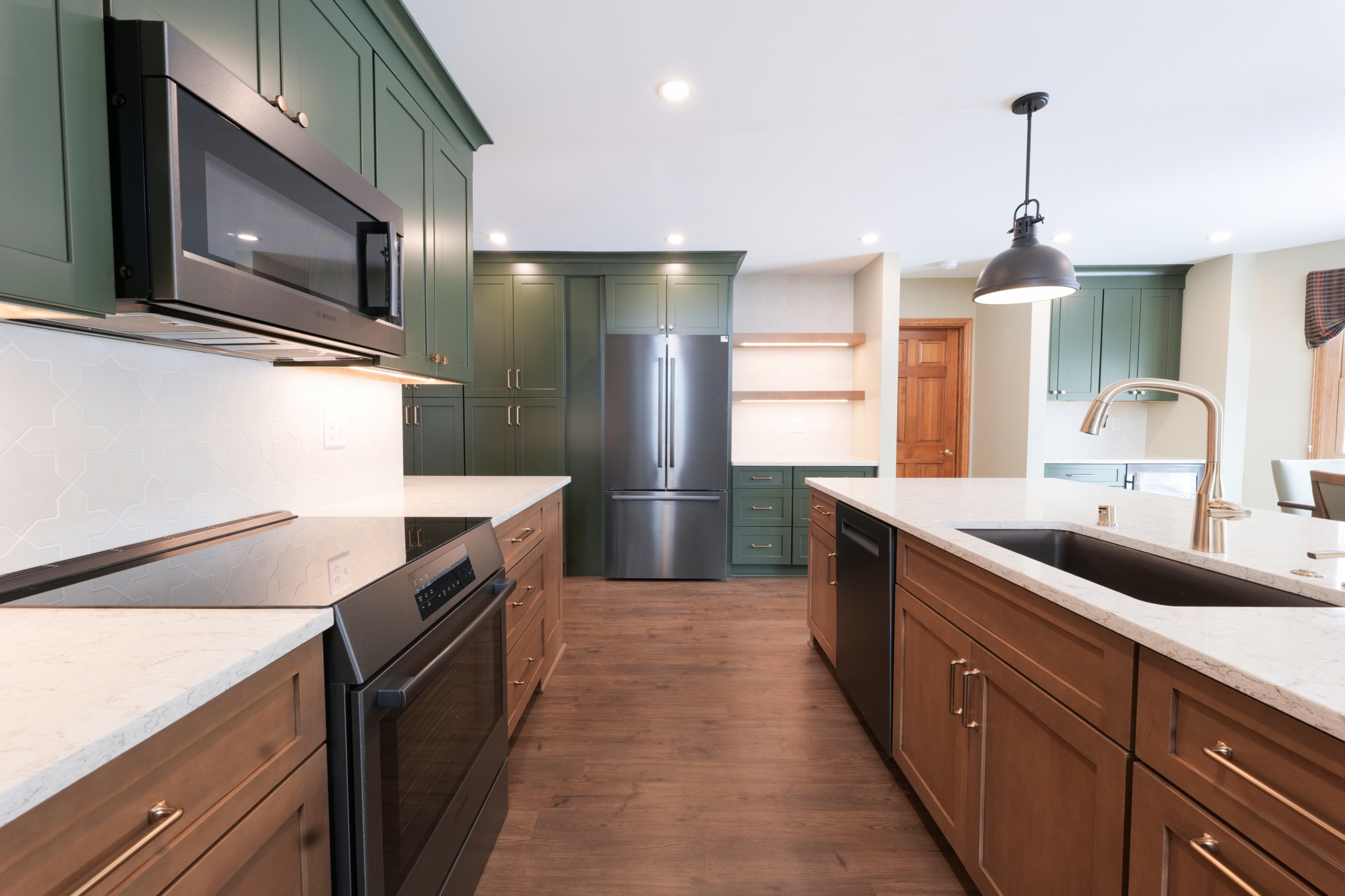 Clean, Modern Feel With Cohesive Finishes Throughout The Home. Kitchen Remodel in New Berlin, WI by GMH CONSTRUCTION project photo