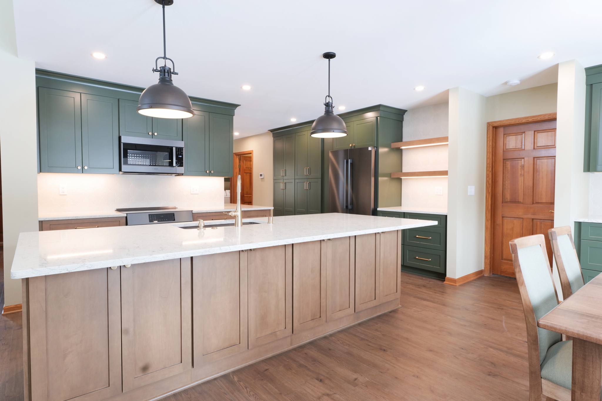 Clean, Modern Feel With Cohesive Finishes Throughout The Home. Kitchen Remodel in New Berlin, WI by GMH CONSTRUCTION project photo 2